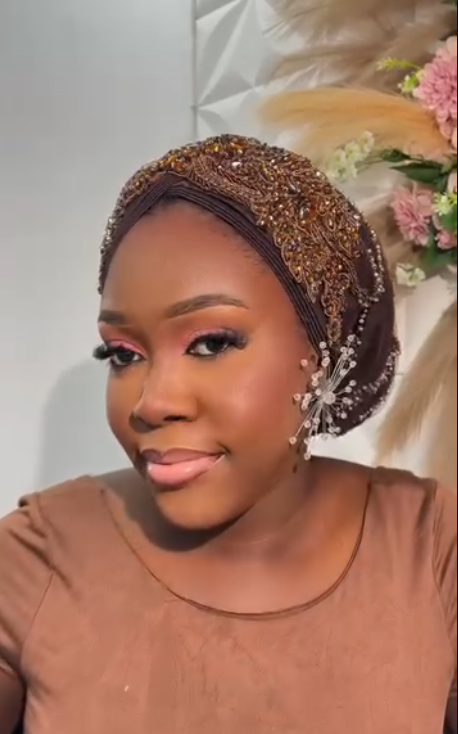 Brown beaded turban with floral ear accessory
